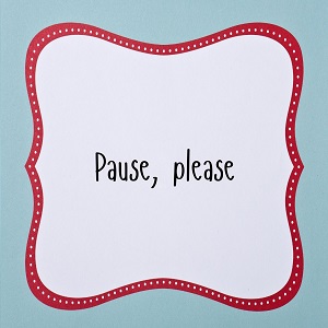 Name tag on an index card that says pause, please.